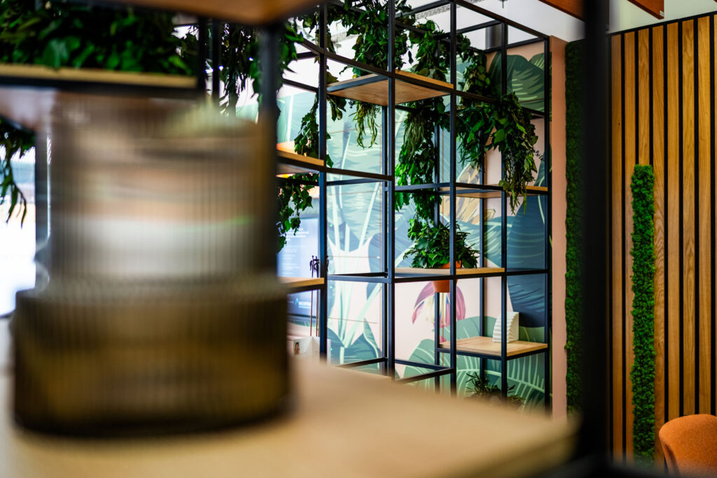 Modern office dividers with biophilic elements.