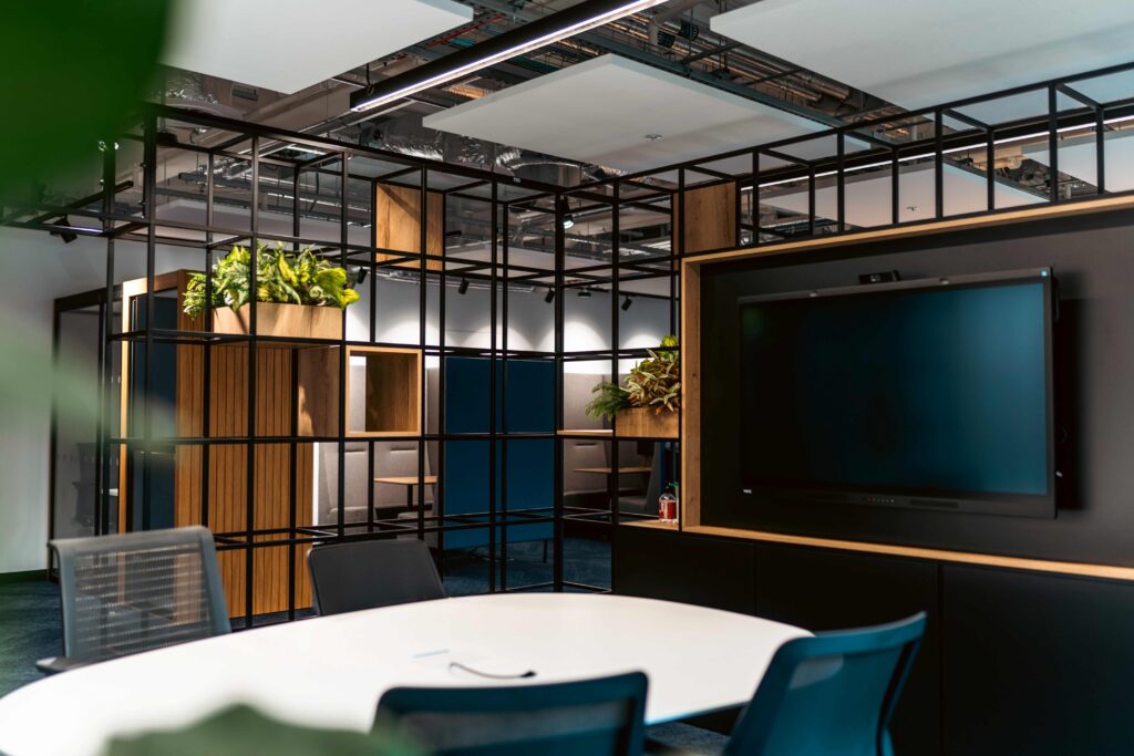 Bespoke office shelving with an integrated TV screen.