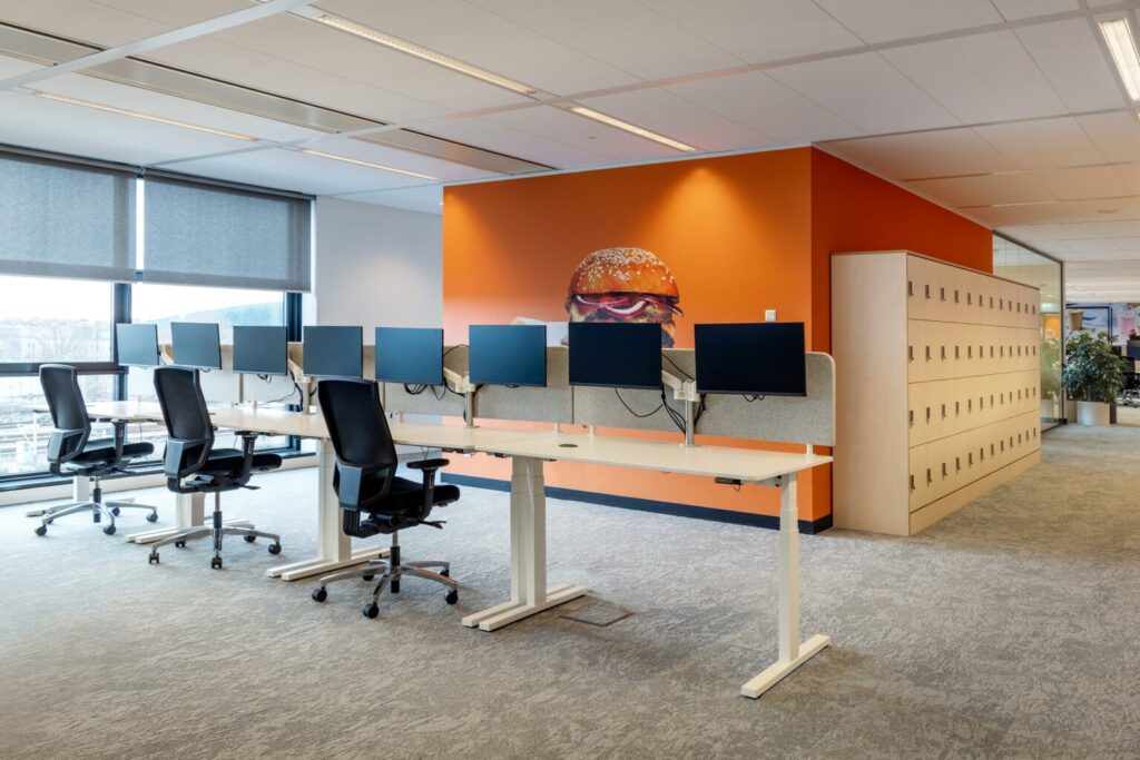 Sit stand desks and the Your Workcharge Smart Puk at Just Eat Takeaway.